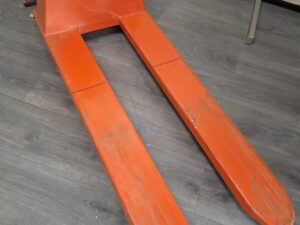 Transpalette manuel orange 1000 kg avec stabilisateurs