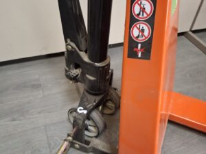 Transpalette manuel orange 1000 kg avec stabilisateurs