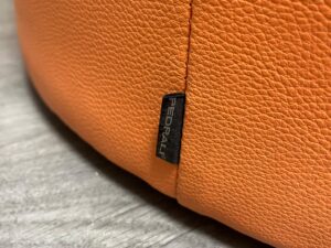 Pouf rond en simili cuir orange – Ø65 cm